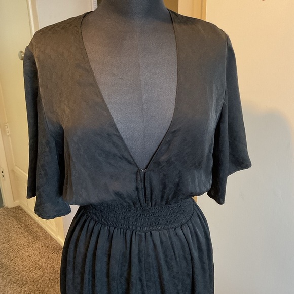 21. Reformation Black Jumpsuit with Sophisticated Wide-Leg Style Size 10 - Picture 9 of 13